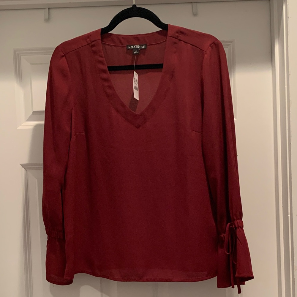 NWT burgundy v neck blouse from J Crew Mercantile. Size 4. Polyester.